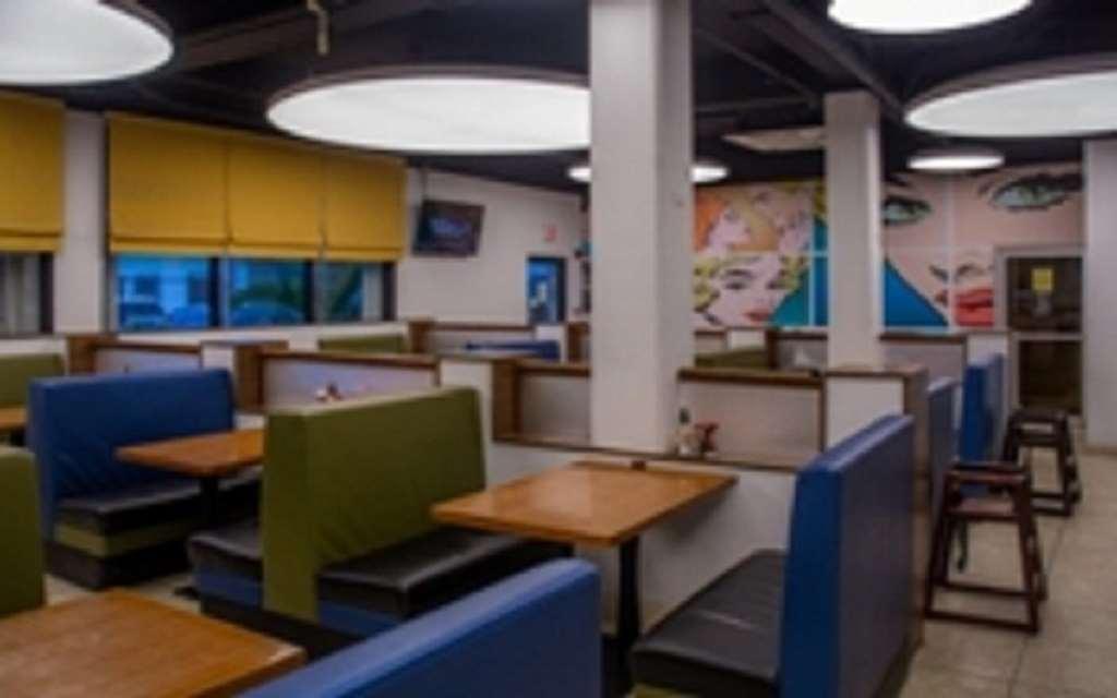 Century Hotel Garapan Restaurang bild